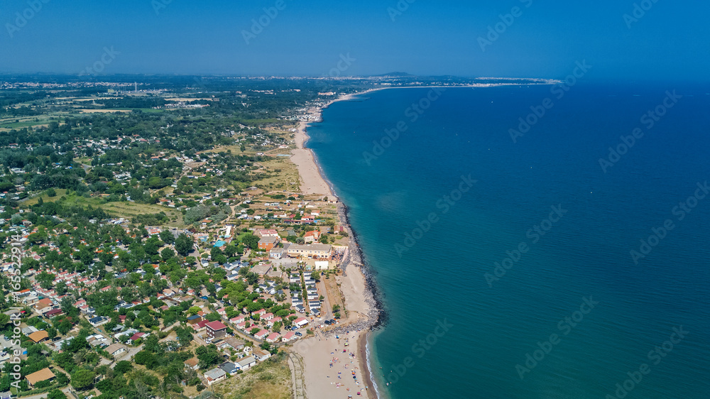Aerial top view of sandy beach of Mediterranean sea from above, vacation concept
