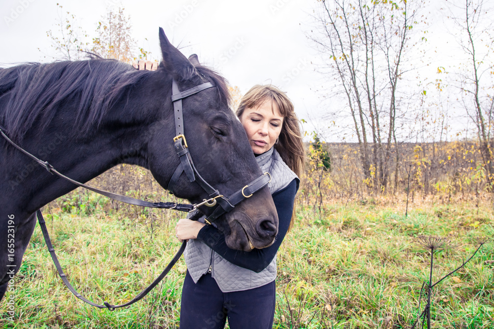 Obraz premium Girl and horse
