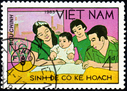 UKRAINE - CIRCA 2017: A postage stamp printed in Vietnam shows Family from series World Food Day, circa 1983