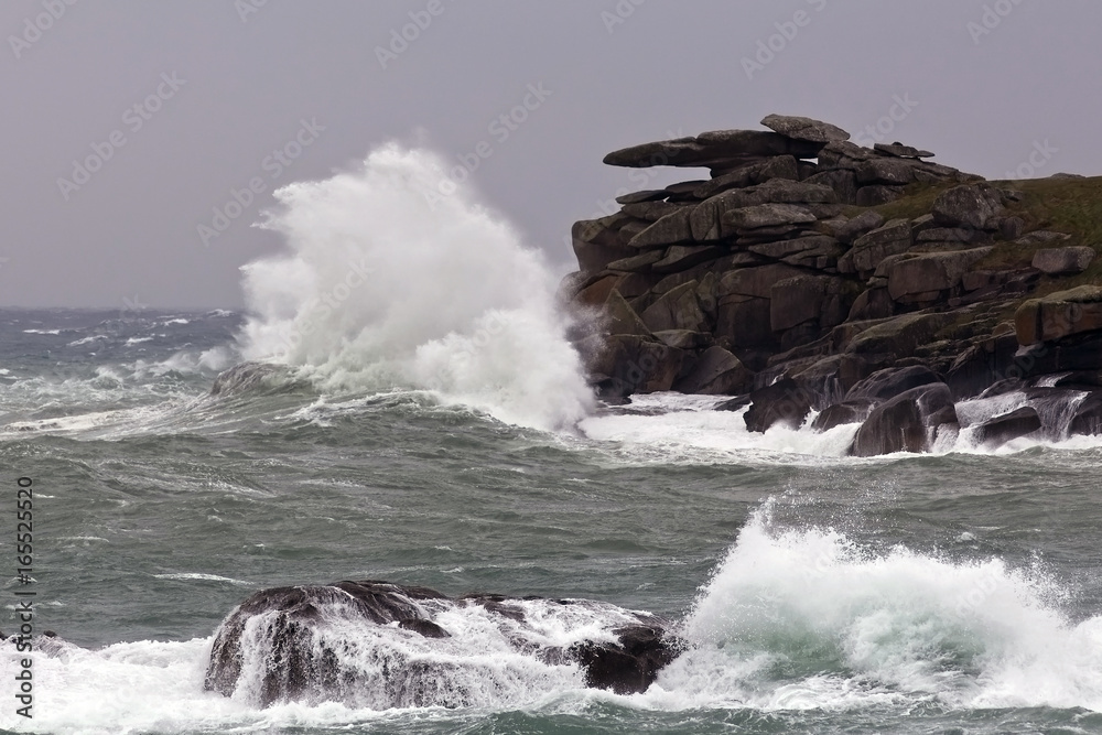 Waves crashing into Pendennis Head, St Mary's, Isles of Scilly, Cornwall, England, UK.