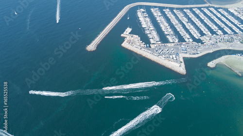 Aerial top view of boats and yachts in modern marina from above, Mediterranean sea, South France 