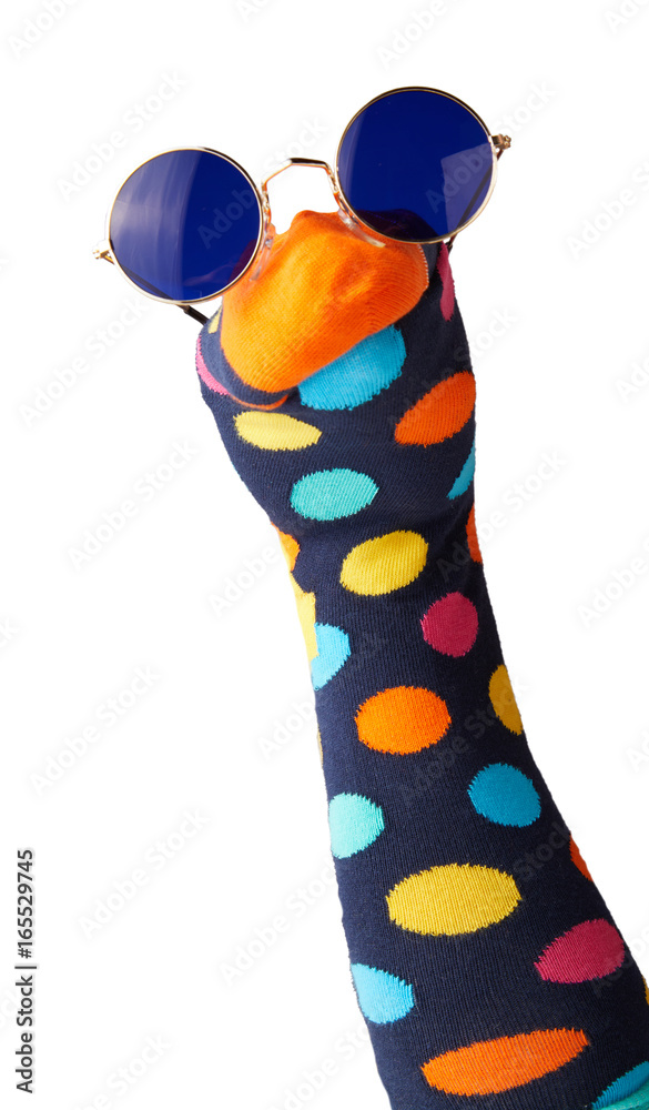 Brightly colored sock puppet with polk dots - obrazy, fototapety, plakaty 
