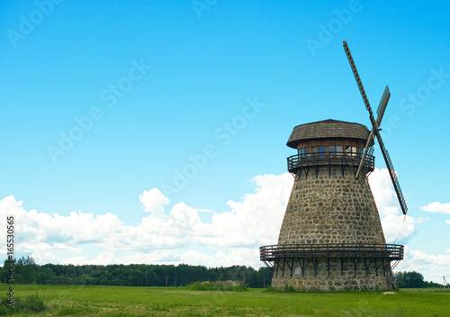 Portrait of classic old tower windmill.