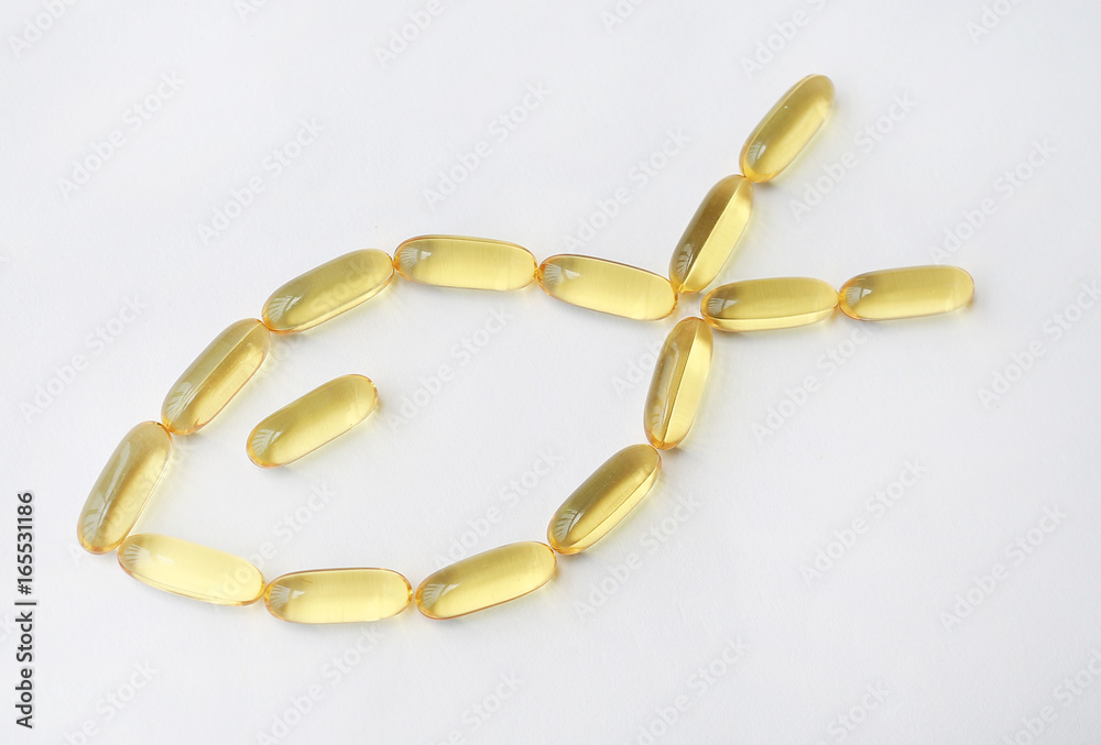 Fish oil capsules on a white background. Fish oil capsules on a white background.