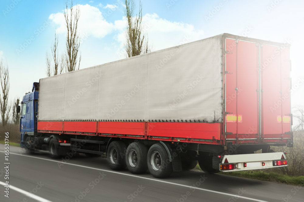 Truck on road. Delivery and shipping concept.