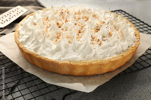 Bild auf Leinwand Grid with delicious coconut cream pie on grey table