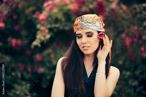 Fashion Woman Wearing Head Scarf in 70’s Retro Style Outfit