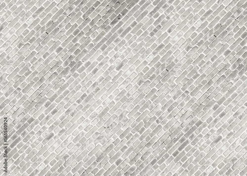 White washed diagonal brick wall texture. Background for text or image. White washed diagonal brick wall texture. Background for text or image.