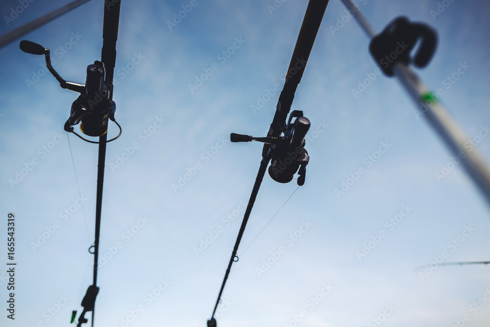 Abstract view of fishing, lake in background, summer sunset Abstract view of fishing, lake in background, summer sunset