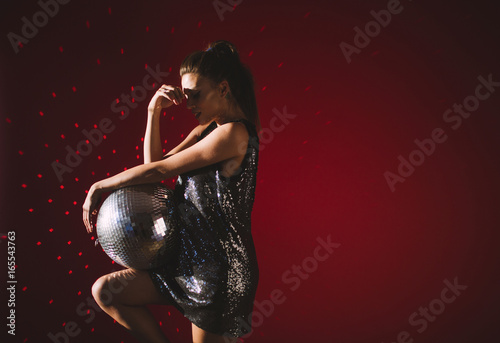 Woman with disco ball 