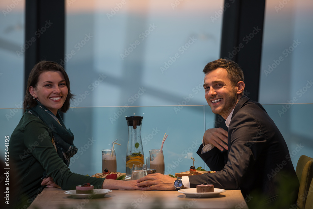 Couple on a romantic dinner at the restaurant