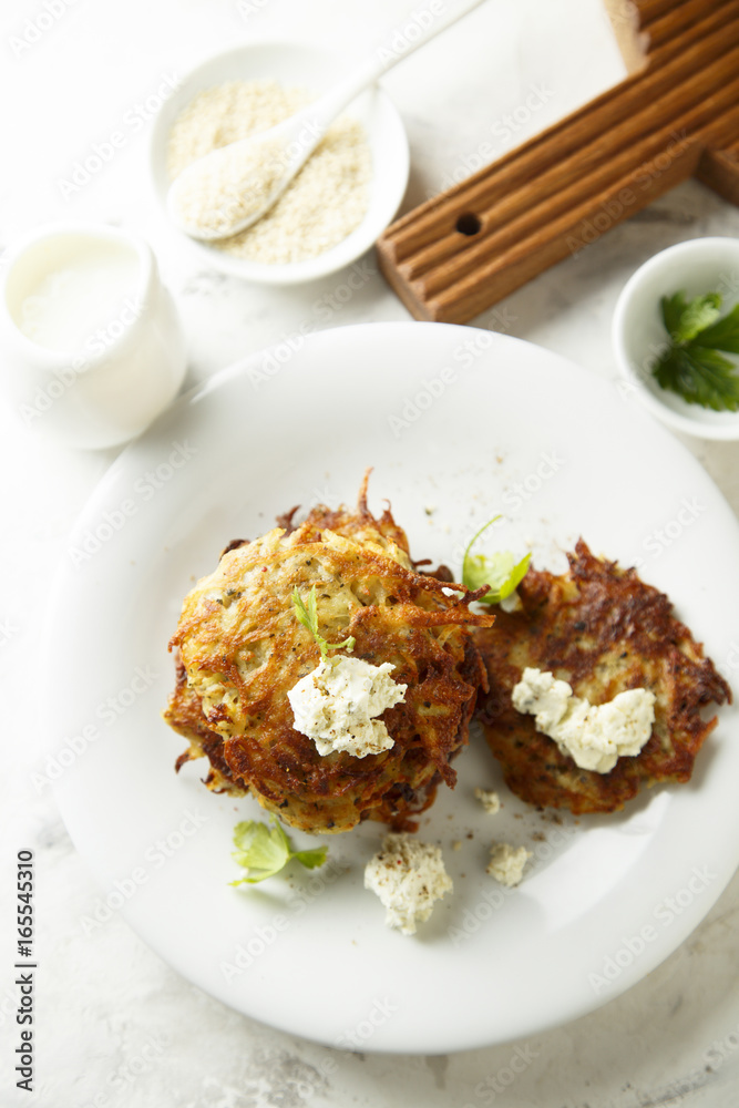 Potato latkes with cream cheese and herbs Potato latkes with cream cheese and herbs