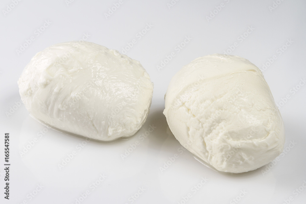 Ingridients for Caprese salad. Mozzarella cheese. Isolated on white background