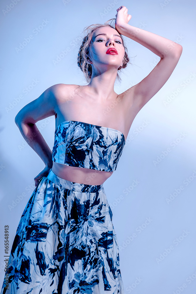 Cute young woman in navy blue dress with creative makeup and hairstyle,  spring and summer tender fashion retouched studio shot Stock Photo | Adobe  Stock