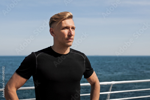 Handsome man on background of sea