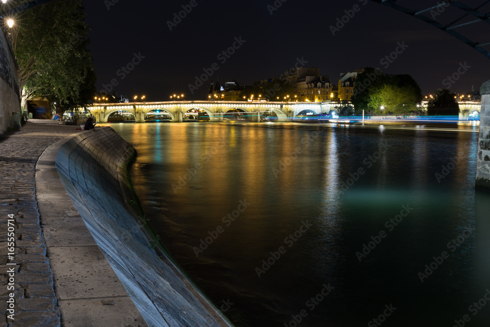 Paris, River Seine side facing bridge Pont Neuf