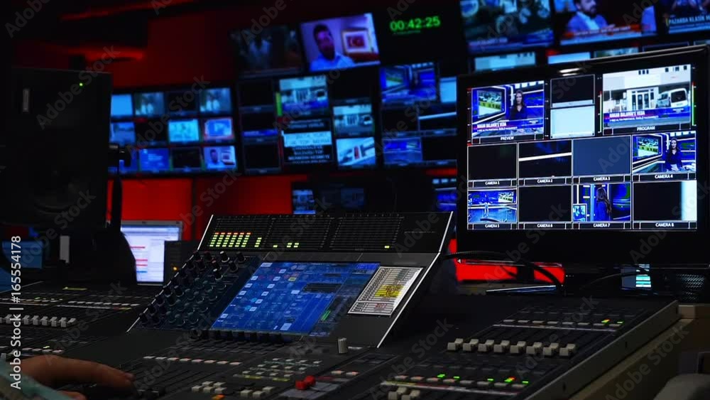 Tv Control Room with  a lot of Screens
