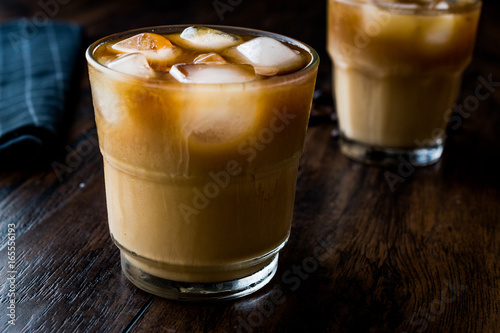 Cold brew coffee with milk and ice. (iced coffee)
