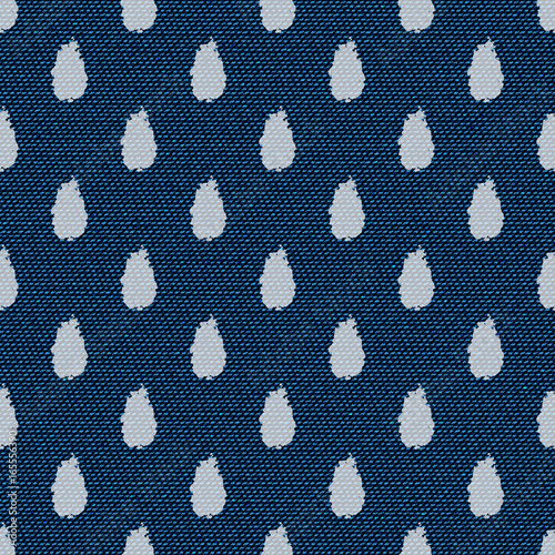 Dark blue jeans seamless texture. Denim background with water drops. Can be used for wallpaper, pattern fills, web page background, surface textures. Denim texture