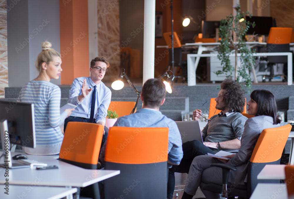 Obraz premium Young Business Team At A Meeting at modern office building