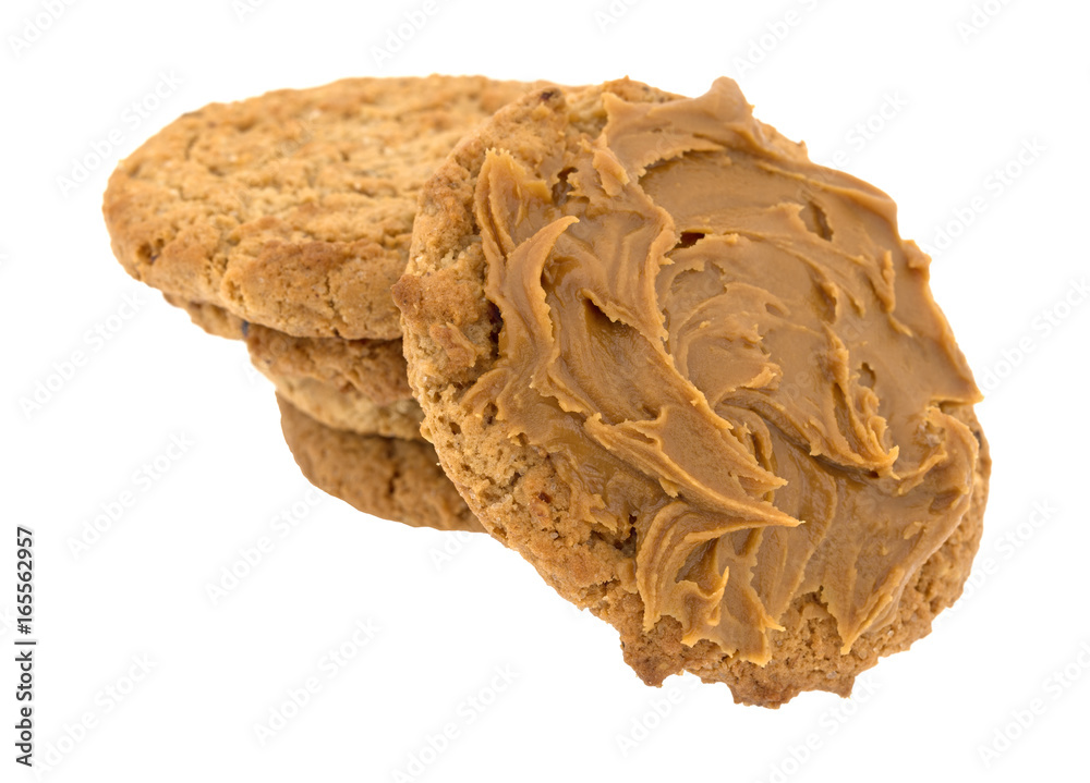 Oatmeal cookies with cookie butter topping isolated on a white background. Oatmeal cookies with cookie butter topping isolated on a white background.