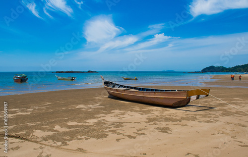 A fishing boat stranded on the melano bay, kuching sarawak on 22nd July 2017 photo