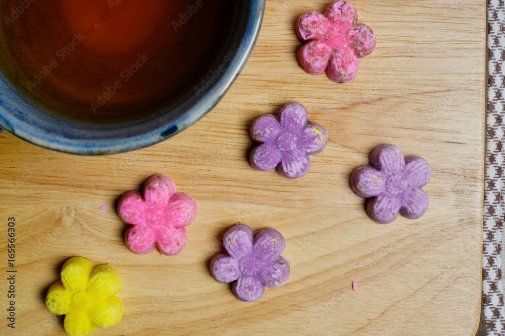 colorful of Thai dessert with a cup of tea on top view