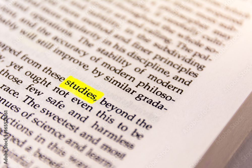 Fototapeta premium Book Highlighted Word Yellow Fluorescent Marker Paper Old Keyword Studies