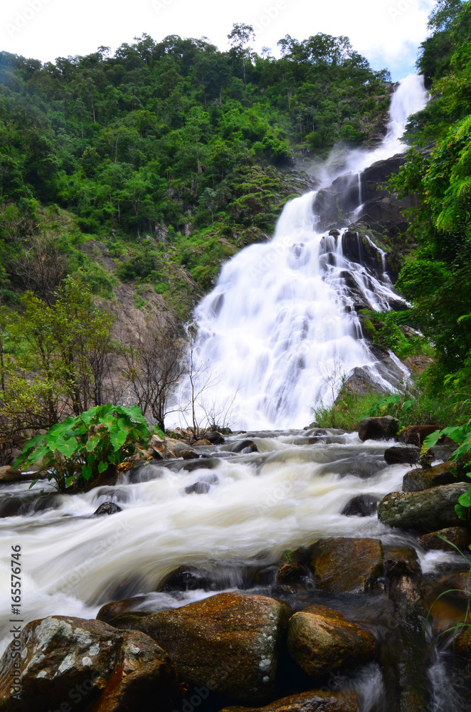 Fototapeta premium Nature landscape of waterfall hidden in the tropical, Thailand