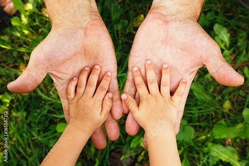 hands grandfather and grandson