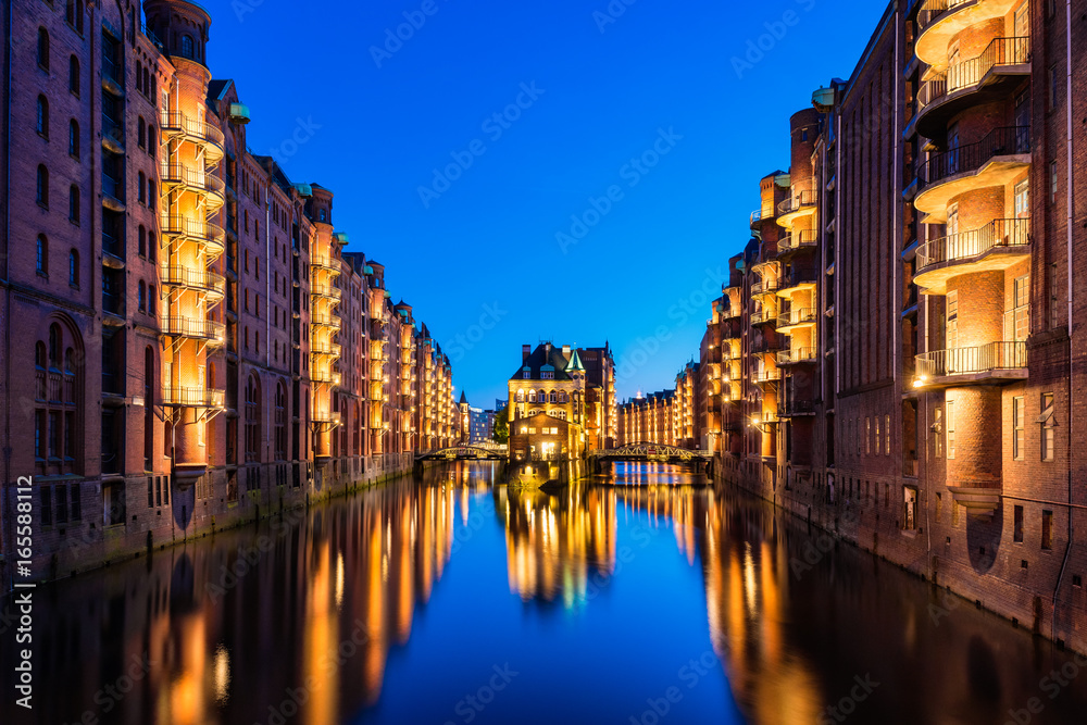 Canal Warehouses in Downtown District of Hamburg Germany at dusk