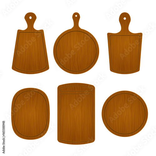 Set of empty wooden cutting boards in different shapes isolated on white background. Vector illustration of kitchen object. Template for menu, cafe or restaurant