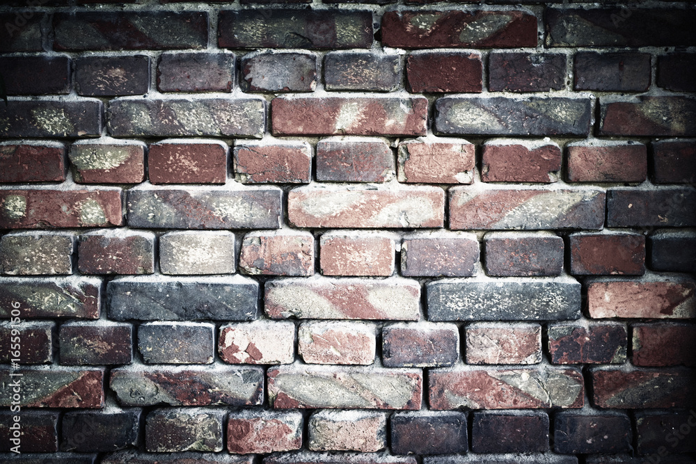 old brick wall for texture or background, vignette effect