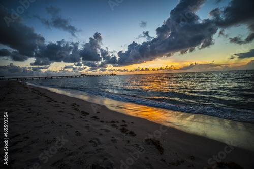 sunrise reflection on the ocean at beach 