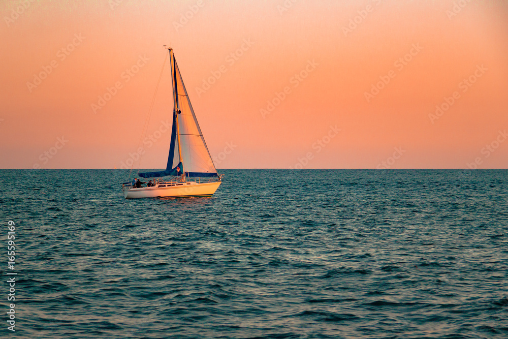 Sailing The Pacific Ocean At Sunset
