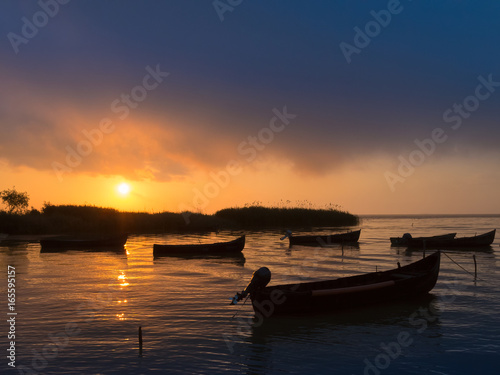 Fototapeta Naklejka Na Ścianę i Meble -  Amazing sunrise / sunset on lake. Sarichioi on Razelm lake. Romania