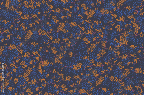Cute tiny flowers on deep blue seamless pattern background