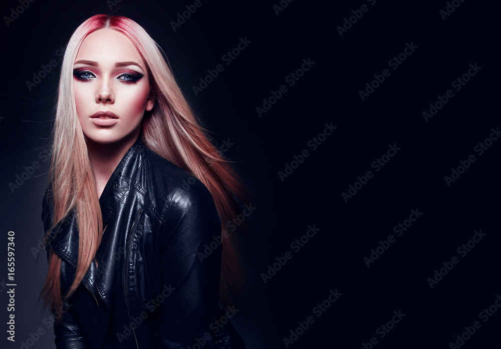 Beautiful blonde girl in black leather jacket and pink hair in rock style  on black , cosmetics, hair care, hair dye, pink color. Fashion  clothes. Fashion, beauty, rock, style, gothic. Stock Photo |