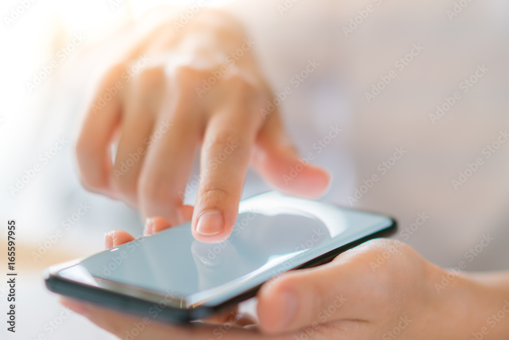 Business hand with mobile phone . Business hand with mobile phone .
