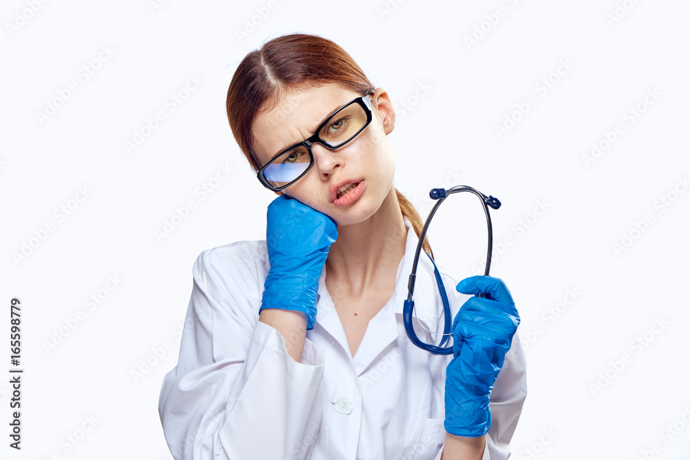 Beautiful young woman on white isolated background, doctor, medicine Beautiful young woman on white isolated background, doctor, medicine