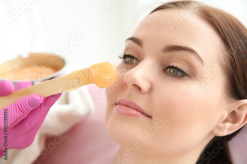 Woman having hair removal p...