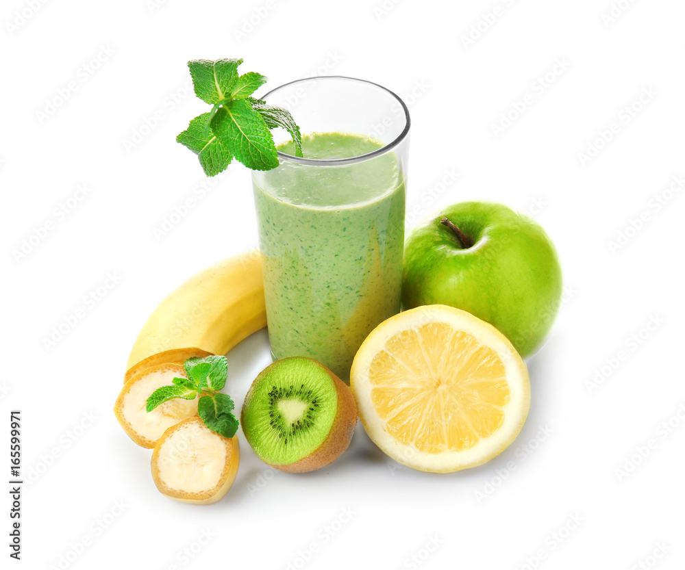 Glass of fresh juice and fruits on white background Glass of fresh juice and fruits on white background