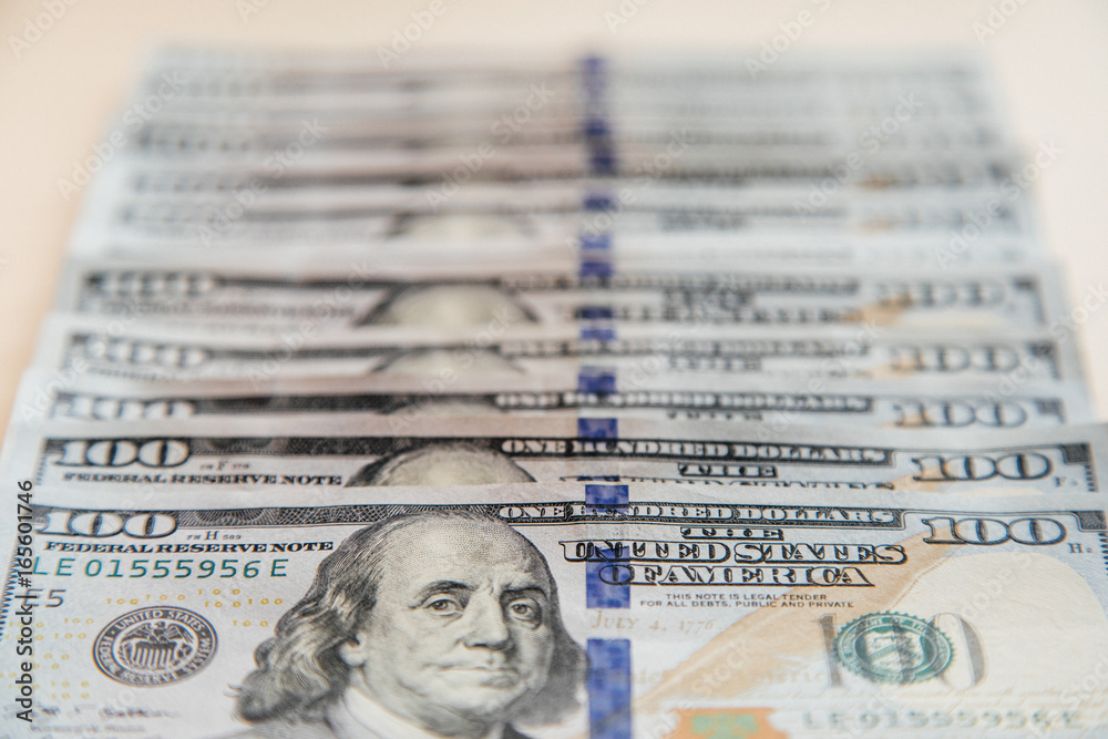 The hundred dollar banknotes as a background The hundred dollar banknotes as a background