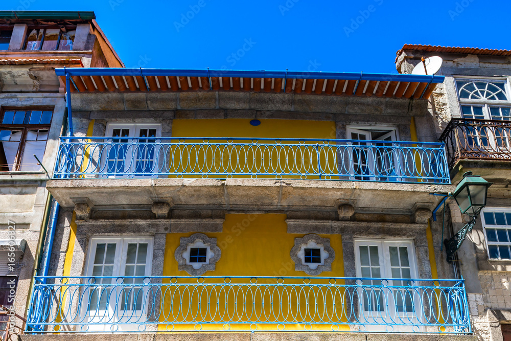 Colorful decorated facades of traditional portugal street