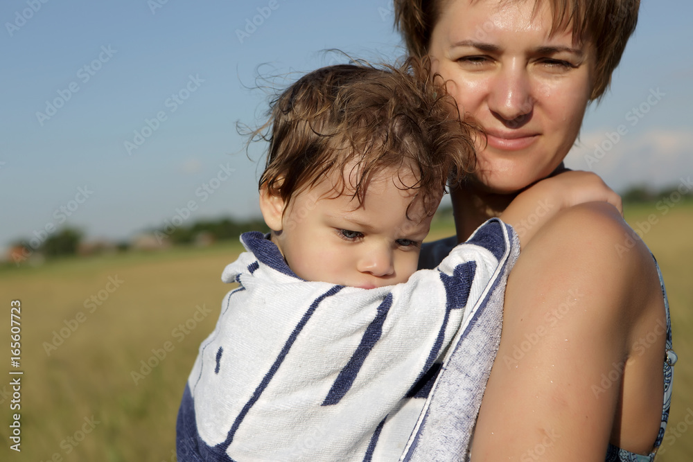 Fototapeta premium Child on mother hands