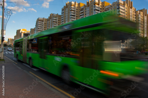 Bus with blur effect during the day/City bus traffic in the daytime along the street with a blur effect 