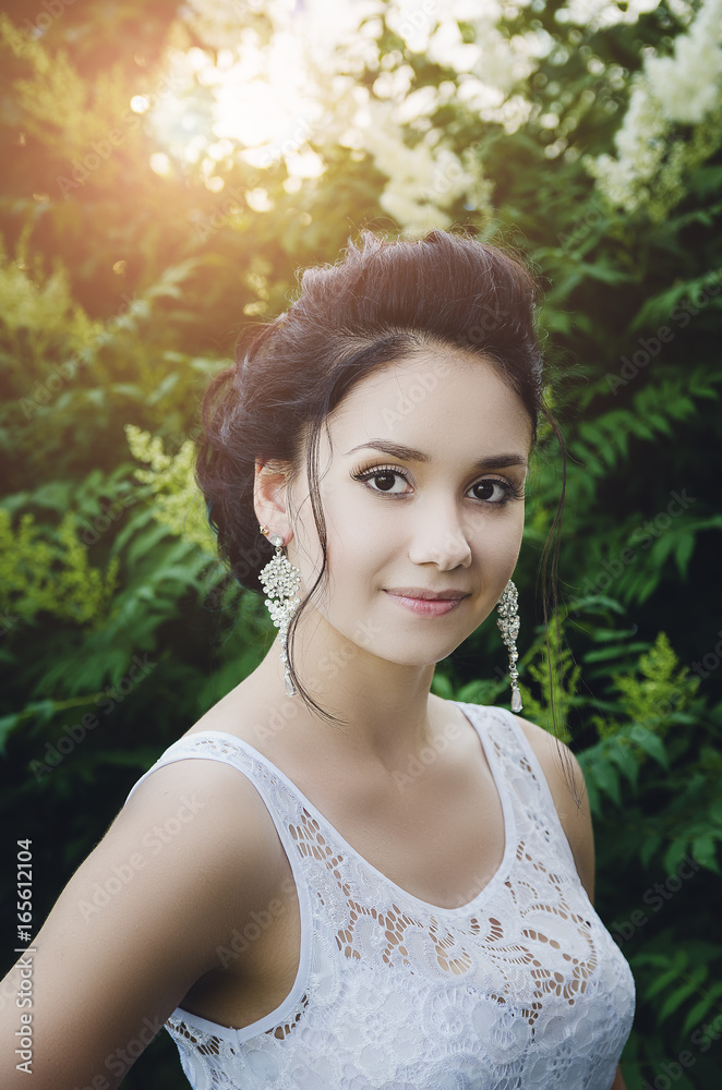 Portrait of a beautiful brunette girl with black eyes. Portrait of a beautiful brunette girl with black eyes.