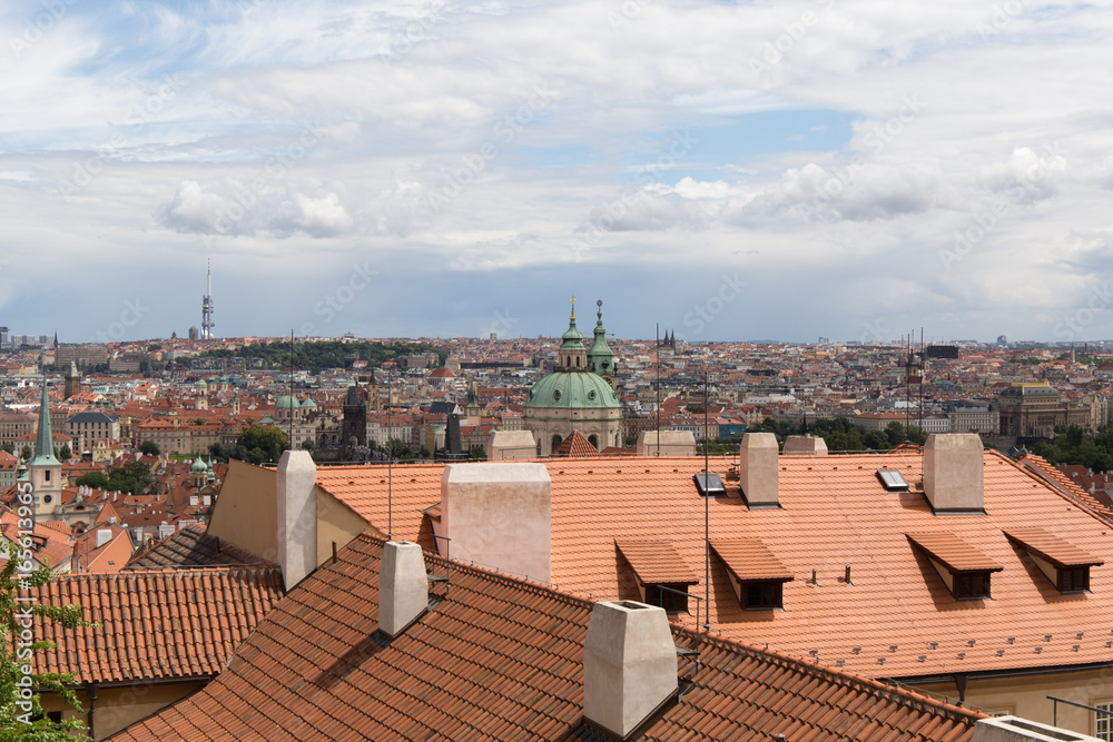 The landscape of the city of Prague and the architectural complex of the old city roofs