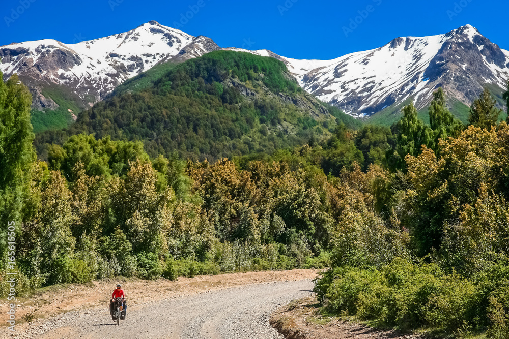 Woman cycling in argentinian Lake District