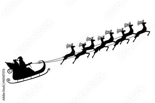 Santa Claus rides in a sleigh in harness on the reindeer
